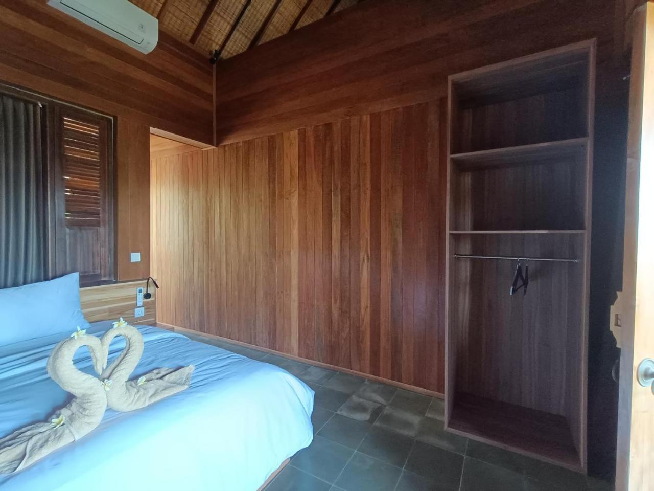 Putra'Lebah Amed Guest House Exteriör bild