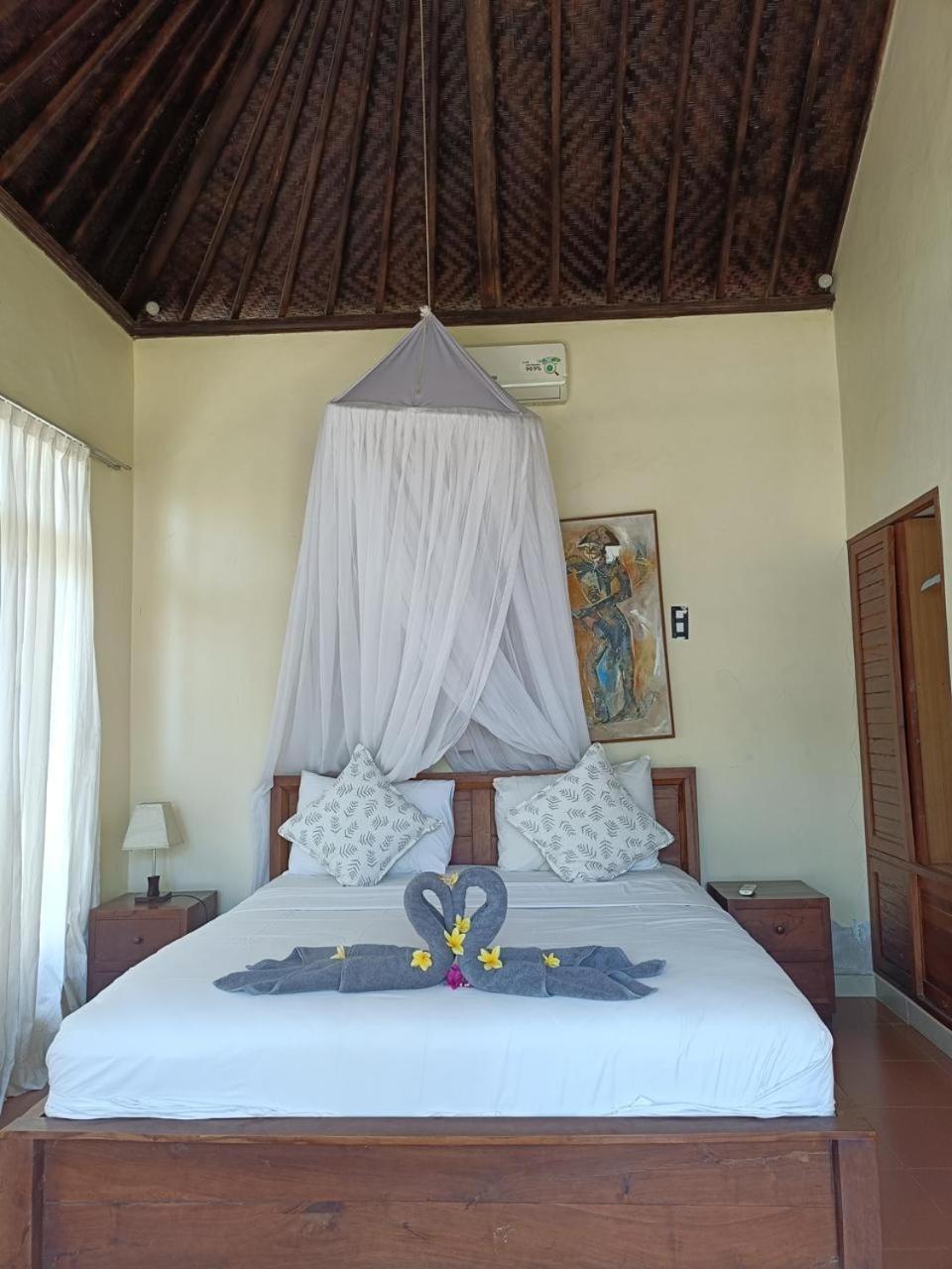 Putra'Lebah Amed Guest House Exteriör bild