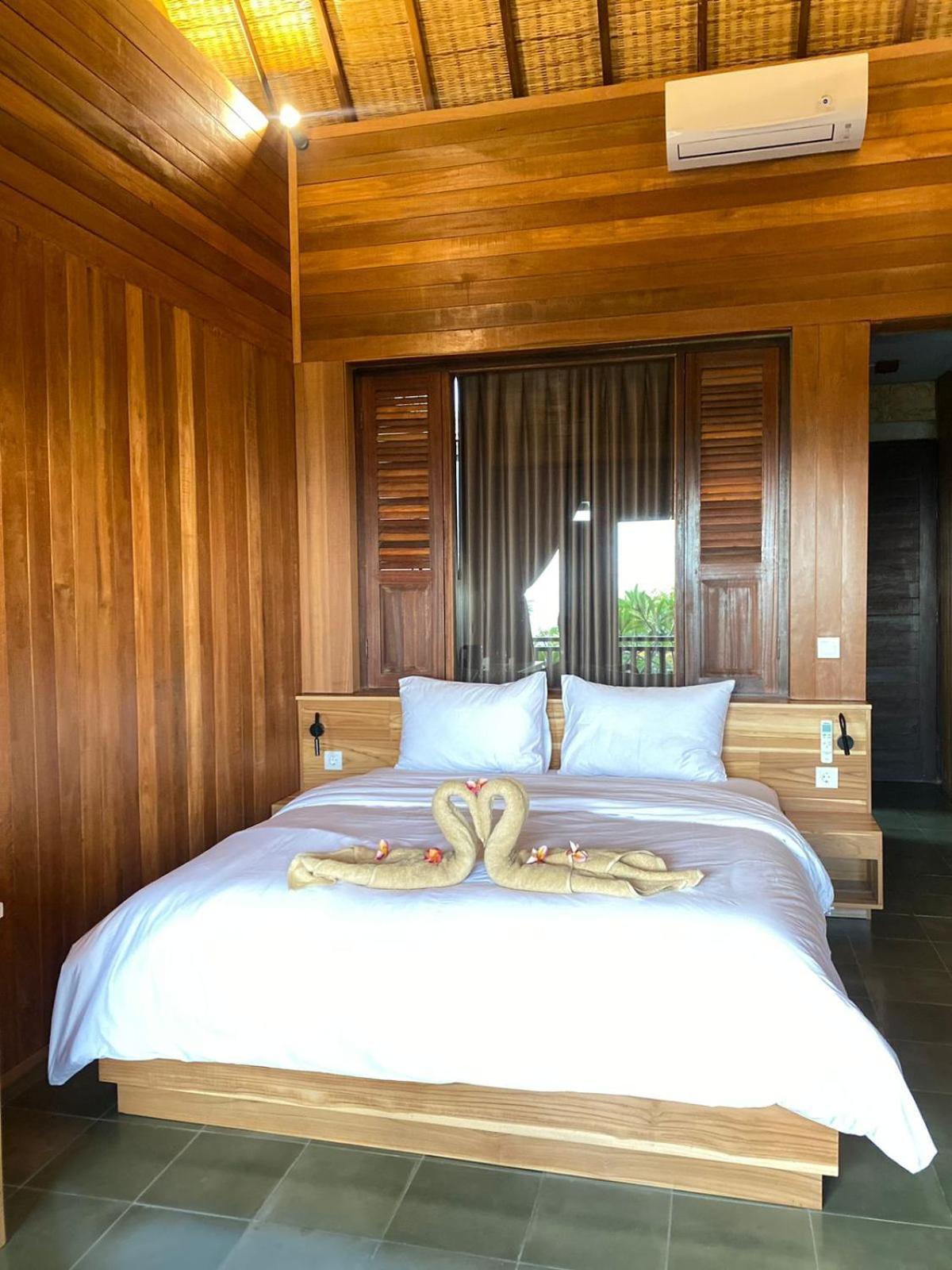 Putra'Lebah Amed Guest House Exteriör bild